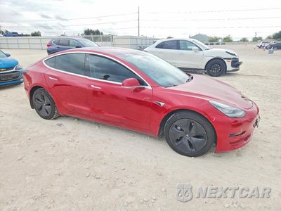 Czwarte zdjęcie samochodu z boku: 2018 TESLA MODEL 3 VIN:5YJ3E1EA3JF039755 - miniatura
