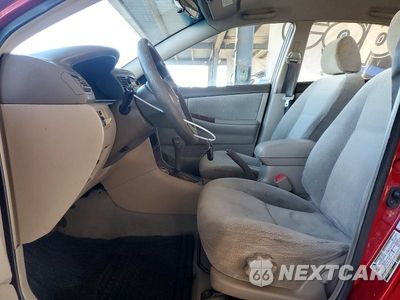 Zdjęcie 7 z 12 samochodu: 2004 TOYOTA COROLLA LE VIN:1NXBR32E94Z342078 - miniatura