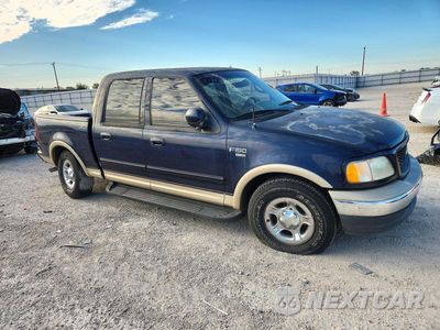 Czwarte zdjęcie samochodu z boku: 2001 FORD F150 SUPERCREW VIN:1FTRW07L31KE15888 - miniatura