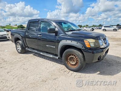 Czwarte zdjęcie samochodu z boku: 2009 NISSAN TITAN XE VIN:1N6AA07C59N317240 - miniatura