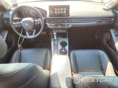 Zdjęcie 8 z 12 samochodu: 2024 HONDA CIVIC TOURING VIN:2HGFE1F93RH330555 - miniatura