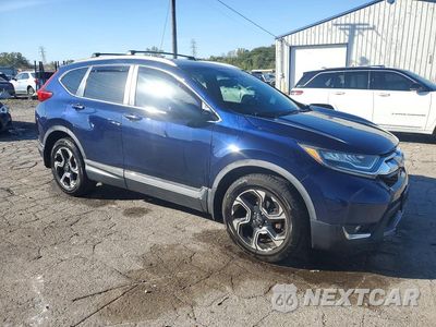 Czwarte zdjęcie samochodu z boku: 2017 HONDA CR-V TOURING VIN:2HKRW1H95HH506775 - miniatura