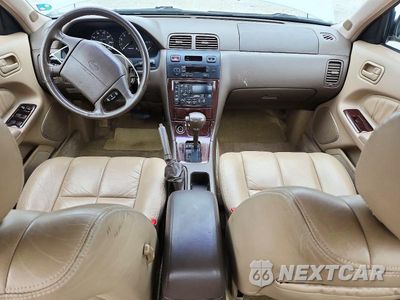 Zdjęcie 8 z 12 samochodu: 1995 NISSAN MAXIMA GXE VIN:JN1CA21D5ST068452 - miniatura