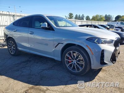 Czwarte zdjęcie samochodu z boku: 2026 BMW X6 XDRIVE40I VIN:5UX33EX07T9291621 - miniatura