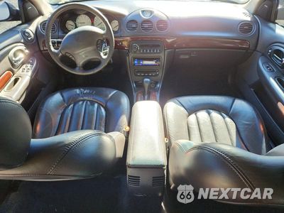 Zdjęcie 8 z 12 samochodu: 2000 CHRYSLER LHS VIN:2C3HC56GXYH370413 - miniatura