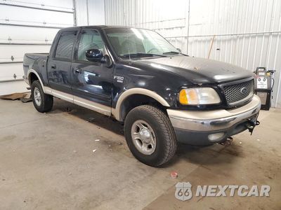 Czwarte zdjęcie samochodu z boku: 2001 FORD F150 SUPERCREW VIN:1FTRW08L31KE19552 - miniatura
