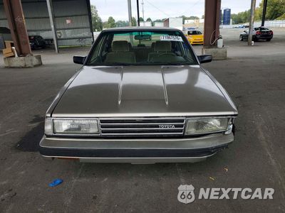 Piąte zdjęcie samochodu w środku: 1986 TOYOTA CAMRY LE VIN:JT2SV16E2G0517886 - miniatura