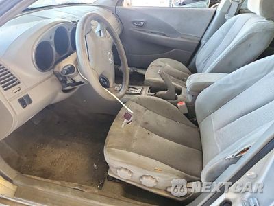 Zdjęcie 7 z 13 samochodu: 2003 NISSAN ALTIMA 2.5 VIN:1N4AL11D33C194003 - miniatura