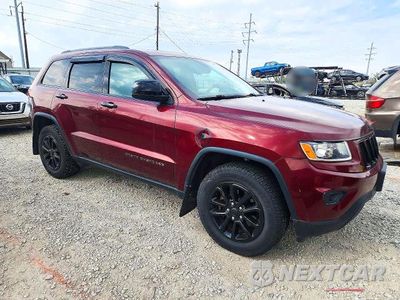 Czwarte zdjęcie samochodu z boku: 2016 JEEP GRAND CHEROKEE LAREDO VIN:1C4RJFAG0GC444104 - miniatura