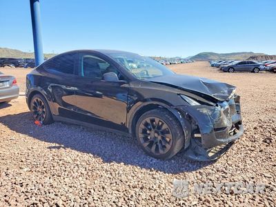 Czwarte zdjęcie samochodu z boku: 2023 TESLA MODEL Y VIN:7SAYGDEE6PA184446 - miniatura