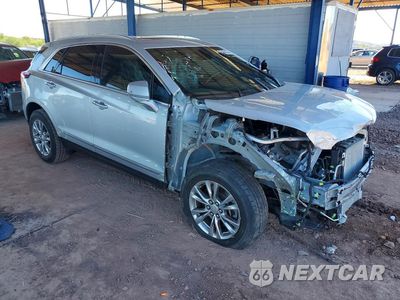 Czwarte zdjęcie samochodu z boku: 2020 CADILLAC XT5 PREMIUM LUXURY VIN:1GYKNCRSXLZ124786 - miniatura