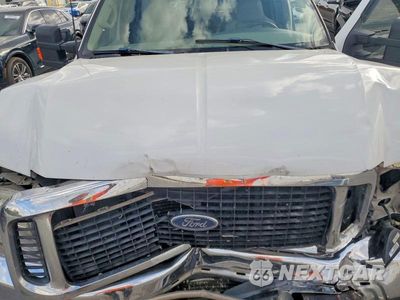 Zdjęcie 12 z 13 samochodu: 2002 FORD EXCURSION LIMITED VIN:1FMSU43F62EB31391 - miniatura