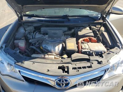 Zdjęcie 11 z 12 samochodu: 2013 TOYOTA CAMRY HYBRID LE VIN:4T1BD1FK2DU080052 - miniatura