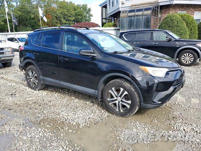 Czwarte zdjęcie samochodu z boku: 2016 TOYOTA RAV4 LE VIN:2T3BFREV6GW479188 - miniatura