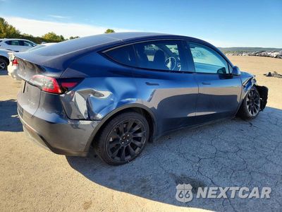 Trzecie zdjęcie samochodu z tyłu: 2023 TESLA MODEL Y VIN:7SAYGDEE2PA051375 - miniatura