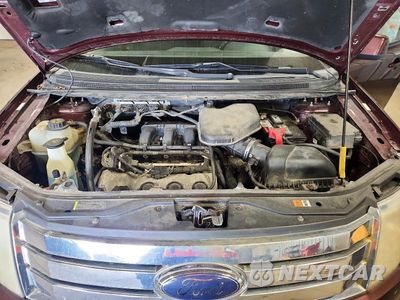 Zdjęcie 12 z 13 samochodu: 2010 FORD EDGE SEL VIN:2FMDK3JC6ABA87730 - miniatura
