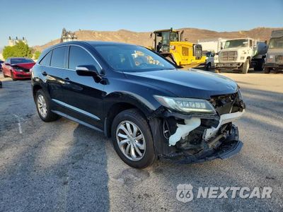 Czwarte zdjęcie samochodu z boku: 2017 ACURA RDX VIN:5J8TB3H39HL002431 - miniatura