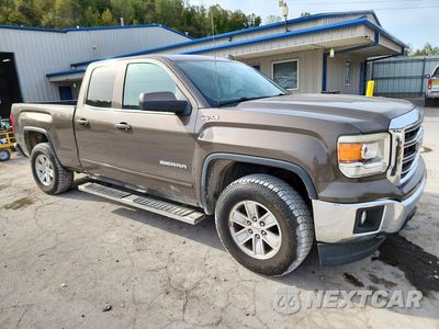 Czwarte zdjęcie samochodu z boku: 2014 GMC SIERRA K1500 SLE VIN:1GTV2UEHXEZ305899 - miniatura