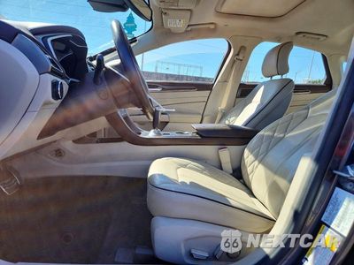 Zdjęcie 7 z 12 samochodu: 2017 FORD FUSION TITANIUM PHEV VIN:3FA6P0SU3HR255510 - miniatura