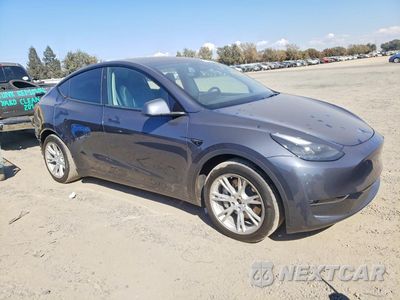 Czwarte zdjęcie samochodu z boku: 2023 TESLA MODEL Y VIN:7SAYGDEE2PF906093 - miniatura