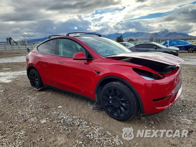 Czwarte zdjęcie samochodu z boku: 2023 TESLA MODEL Y VIN:7SAYGDEE3PF609219 - miniatura
