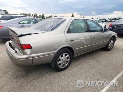 Trzecie zdjęcie samochodu z tyłu: 1999 TOYOTA CAMRY LE V6 VIN:JT2BF22K6X0183120 - miniatura