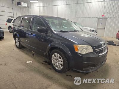 Czwarte zdjęcie samochodu z boku: 2014 DODGE GRAND CARAVAN SE VIN:2C4RDGBG1ER323615 - miniatura