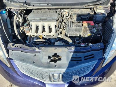 Zdjęcie 11 z 12 samochodu: 2009 HONDA FIT SPORT VIN:JHMGE88409S065727 - miniatura