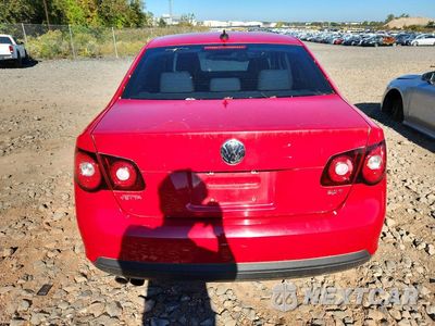 Zdjęcie 6 z 12 samochodu: 2010 VOLKSWAGEN JETTA WOLFSBURG VIN:3VWRA7AJ6AM053558 - miniatura