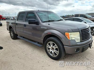Czwarte zdjęcie samochodu z boku: 2014 FORD F150 SUPERCREW VIN:1FTFW1CF8EFC92631 - miniatura