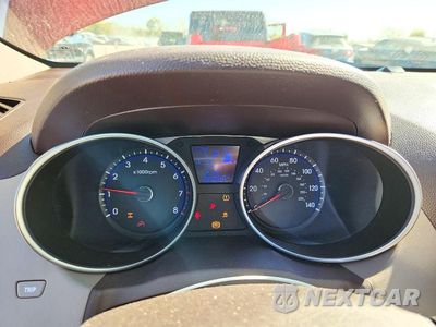 Zdjęcie 9 z 13 samochodu: 2012 HYUNDAI TUCSON GLS VIN:KM8JUCAC0CU374054 - miniatura