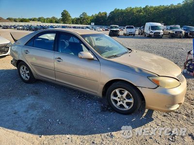 Czwarte zdjęcie samochodu z boku: 2003 TOYOTA CAMRY LE VIN:4T1BE32K43U136585 - miniatura