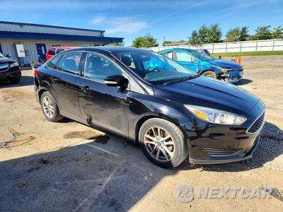 Czwarte zdjęcie samochodu z boku: 2017 FORD FOCUS SE VIN:1FADP3F29HL327830 - miniatura