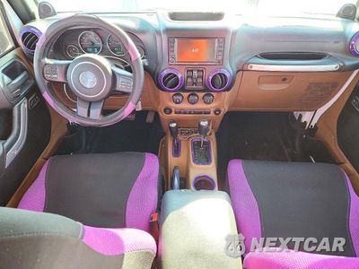 Zdjęcie 8 z 13 samochodu: 2011 JEEP WRANGLER UNLIMITED RUBICON VIN:1J4BA6H13BL584489 - miniatura