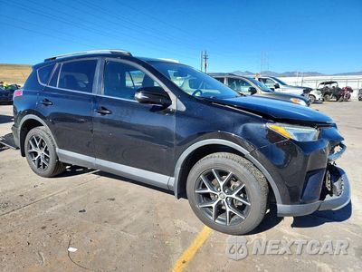 Czwarte zdjęcie samochodu z boku: 2016 TOYOTA RAV4 SE VIN:2T3JFREV9GW436119 - miniatura