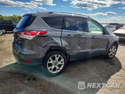 Trzecie zdjęcie samochodu z tyłu: 2014 FORD ESCAPE TITANIUM VIN:1FMCU0JX4EUE36925 - miniatura