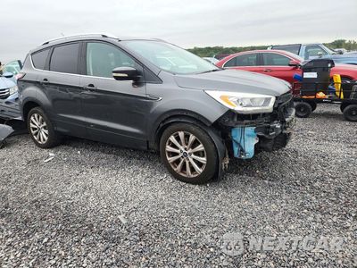 Czwarte zdjęcie samochodu z boku: 2017 FORD ESCAPE TITANIUM VIN:1FMCU9J91HUD41152 - miniatura