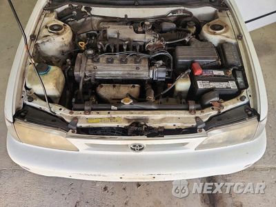 Zdjęcie 11 z 12 samochodu: 1997 TOYOTA COROLLA BASE VIN:1NXBA02E1VZ598691 - miniatura