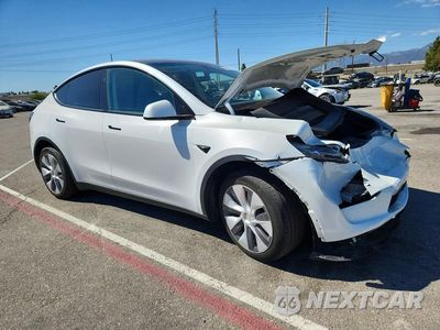 Czwarte zdjęcie samochodu z boku: 2024 TESLA MODEL Y VIN:7SAYGDEE6RF083381 - miniatura