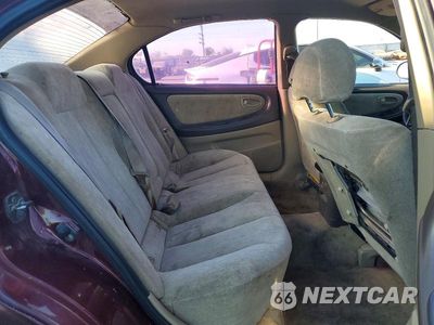 Zdjęcie 10 z 12 samochodu: 2001 NISSAN MAXIMA GXE VIN:JN1CA31D71T629612 - miniatura