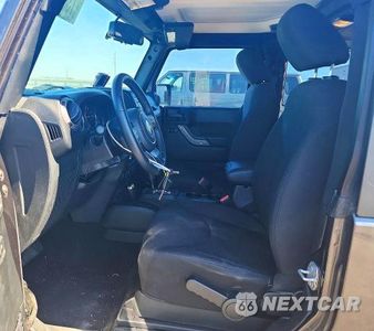 Zdjęcie 7 z 14 samochodu: 2017 JEEP WRANGLER SPORT VIN:1C4AJWAG6HL711406 - miniatura