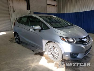 Czwarte zdjęcie samochodu z boku: 2017 HONDA FIT EX VIN:3HGGK5G76HM707168 - miniatura