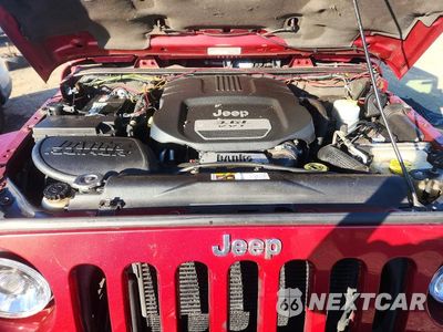 Zdjęcie 12 z 13 samochodu: 2013 JEEP WRANGLER UNLIMITED SAHARA VIN:1C4BJWEG2DL571458 - miniatura