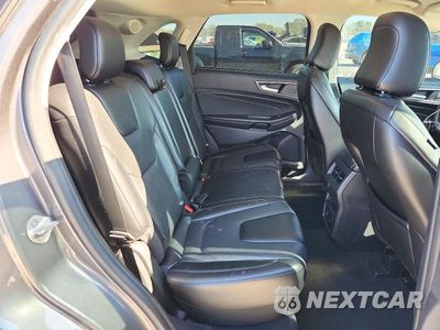 Zdjęcie 11 z 14 samochodu: 2022 FORD EDGE TITANIUM VIN:2FMPK4K92NBA17122 - miniatura