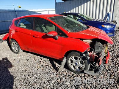 Czwarte zdjęcie samochodu z boku: 2014 FORD FIESTA SE VIN:3FADP4EJ9EM111825 - miniatura