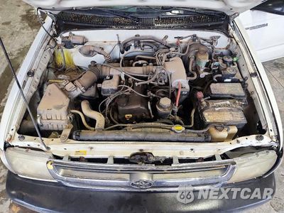 Zdjęcie 11 z 13 samochodu: 2000 TOYOTA TACOMA BASE VIN:4TANL42N6YZ625633 - miniatura
