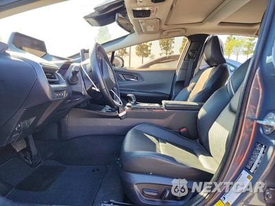 Zdjęcie 7 z 12 samochodu: 2024 TOYOTA PRIUS XLE VIN:JTDACAAUXR3031366 - miniatura