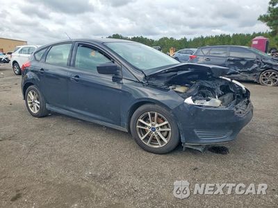 Czwarte zdjęcie samochodu z boku: 2018 FORD FOCUS SE VIN:1FADP3K22JL329446 - miniatura