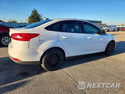 Trzecie zdjęcie samochodu z tyłu: 2017 FORD FOCUS SE VIN:1FADP3FE9HL315297 - miniatura