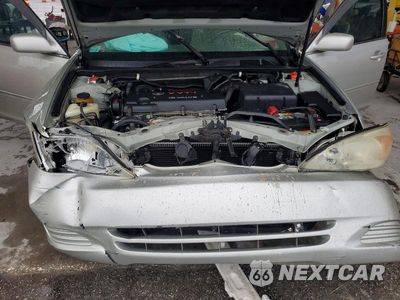Zdjęcie 11 z 12 samochodu: 2002 TOYOTA CAMRY XLE VIN:4T1BE32K12U058488 - miniatura